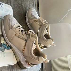 Michael kors with sneakers size 11. They look pretty new.